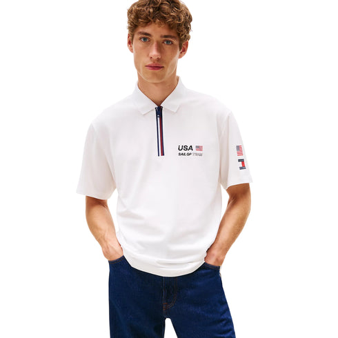Polo Uomo a tinta unita, con mezza zip e bandiere applicate sulla manica
